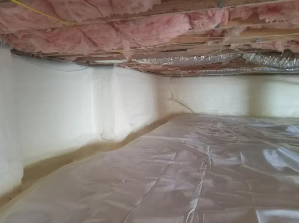 Crawl space encapsulation with closed-cell spray foam for Commercial Roof Restoration in Harvard